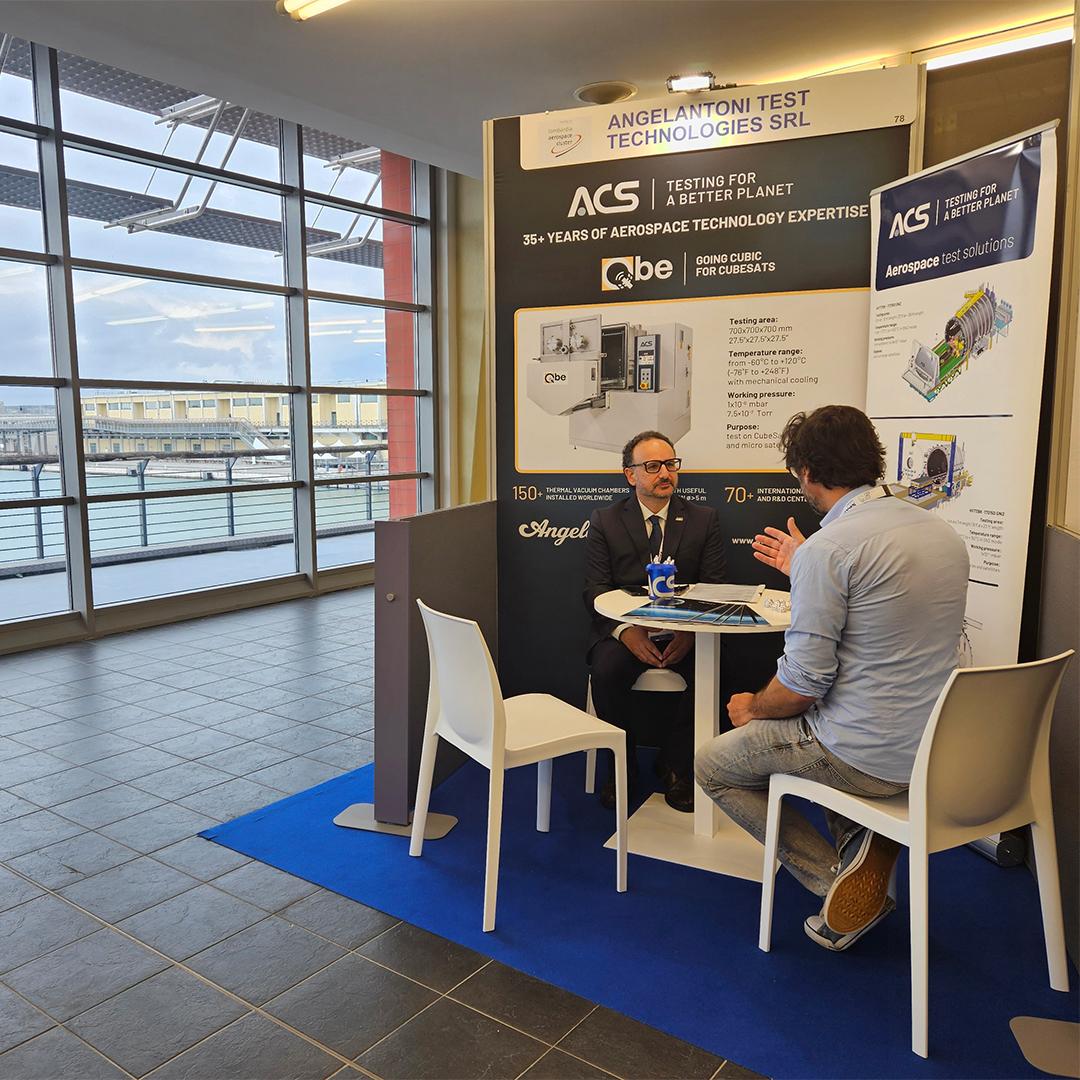 B2B meeting at the ACS booth during Space Meetings Veneto in Venice, focused on thermal vacuum chambers for aerospace and CubeSat testing.